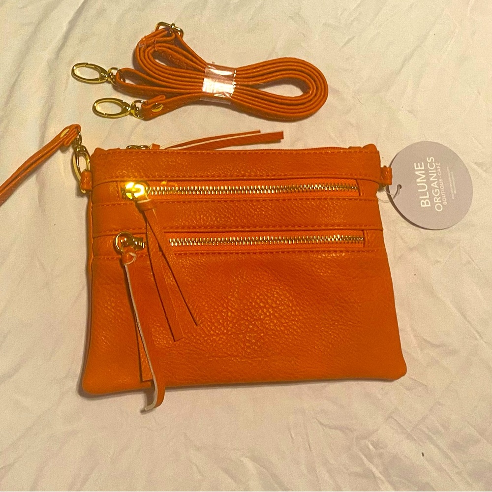 - Blume Organics Boutique & Café: Orange/Tangerine purse with with long st…
